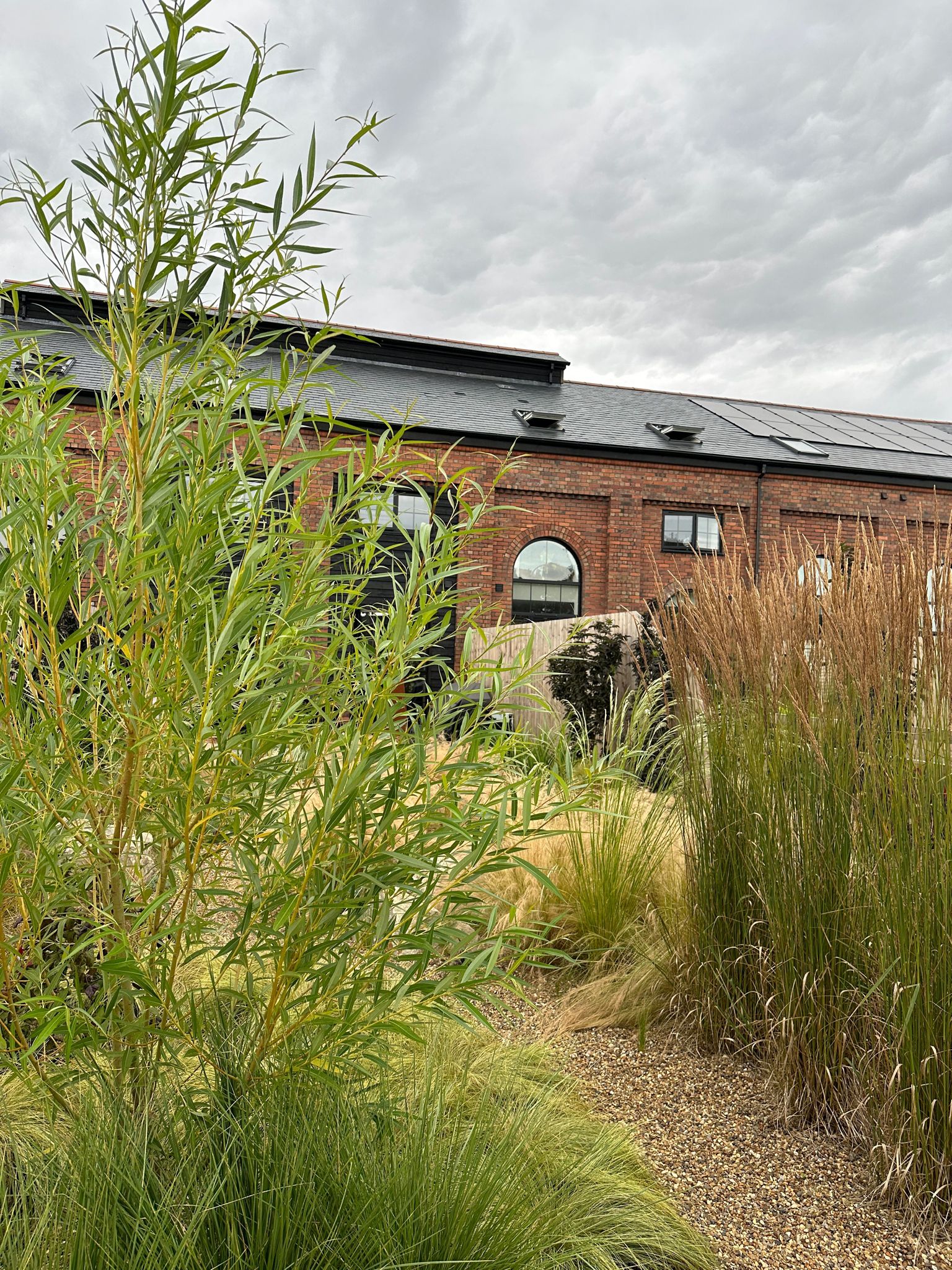 The Miner’s Retreat harmonious planting with rustic feel